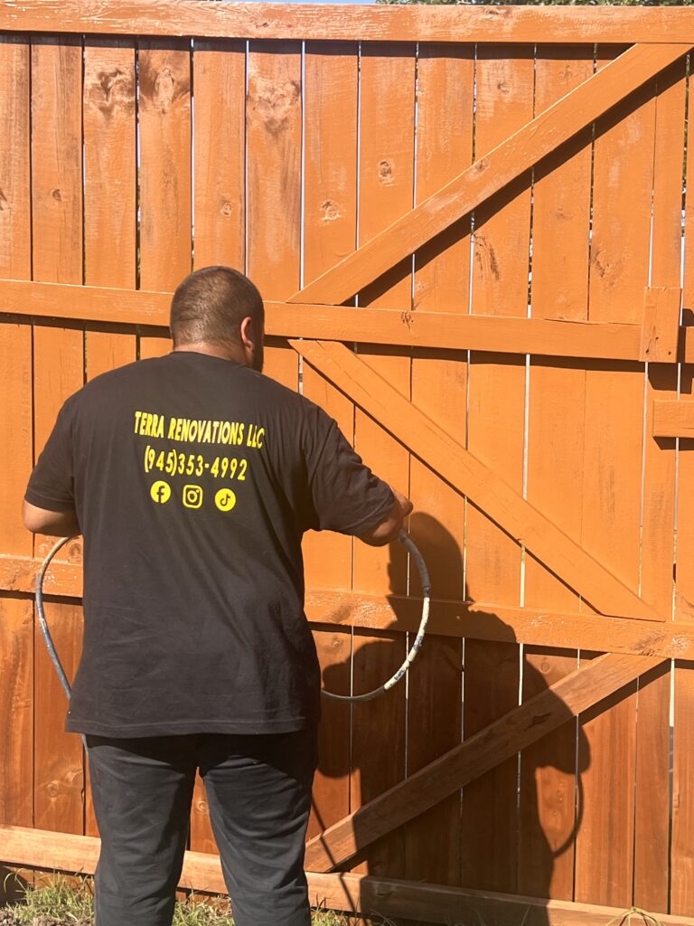 New fence stained by Terra Renovations in Garland Texas