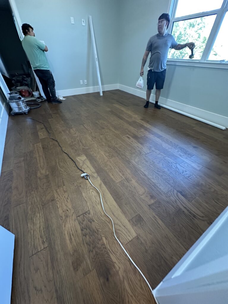 Wood-look flooring installation in a remodeled room by Terra Renovations, Dallas-Fort Worth flooring contractor