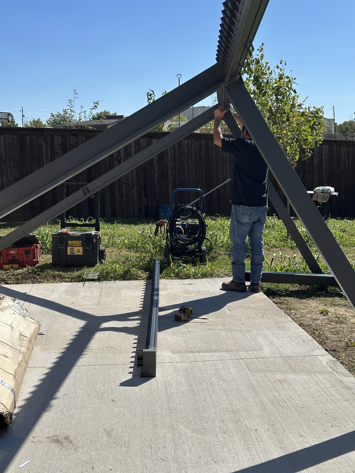 Assembling a steel pergola frame, custom outdoor structures Fort Worth TX