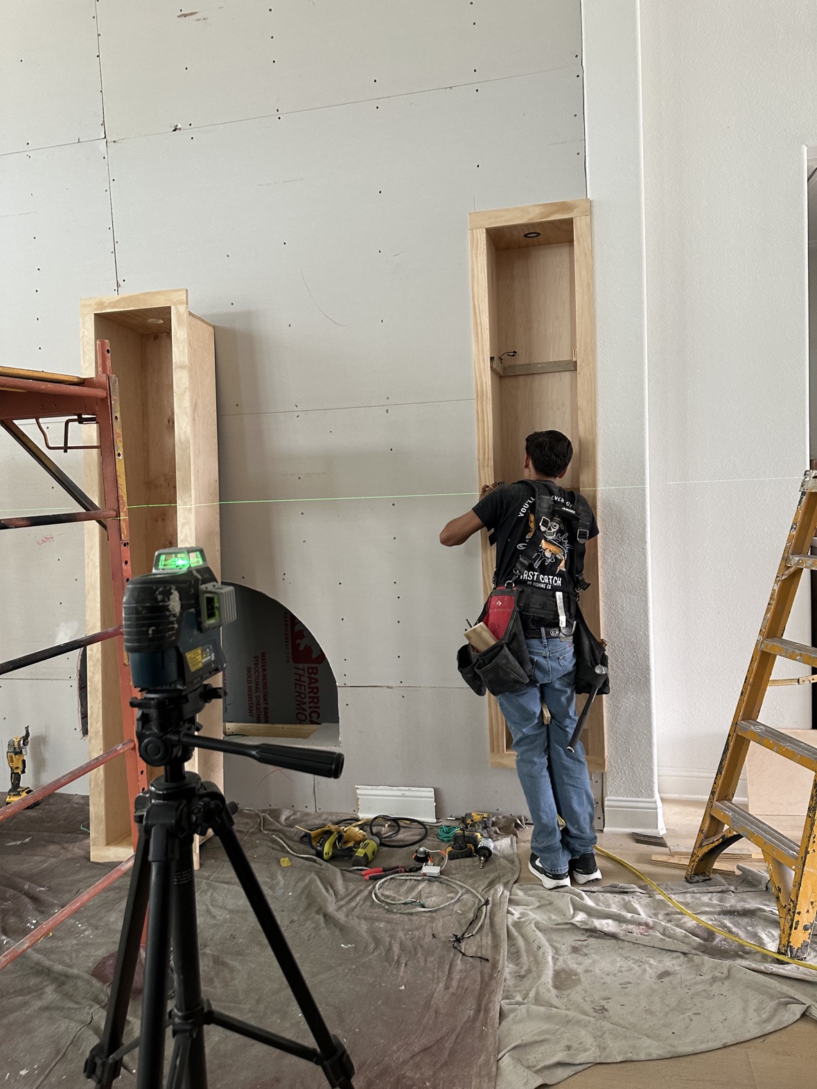 Soft gray wainscoting in bright room, custom carpentry DFW