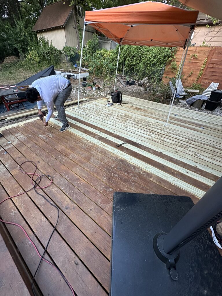 Deck installation in progress by a deck contractor in Dallas Fort Worth TX